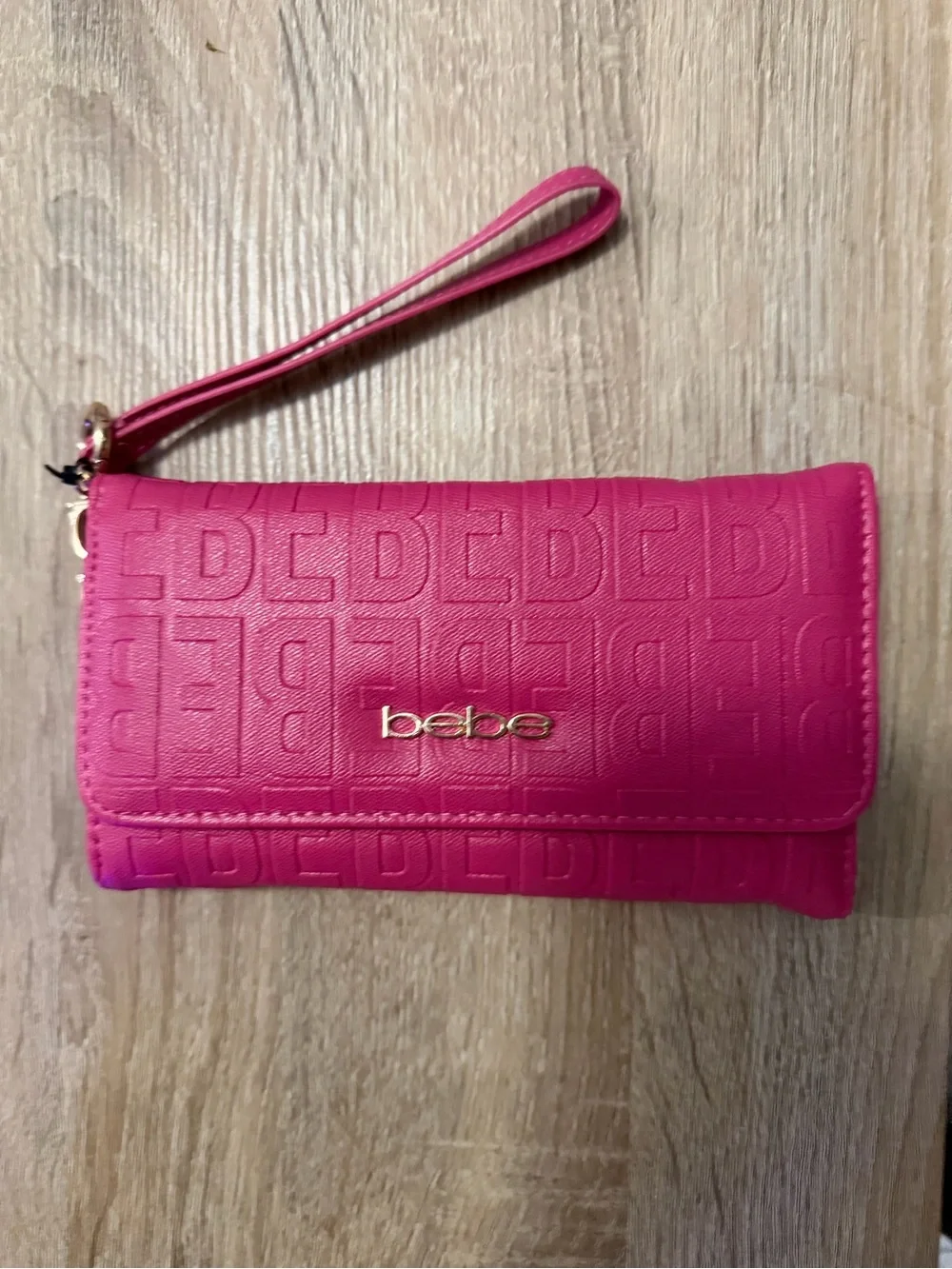 bebe Hot Pink Embossed Wristlet Clutch